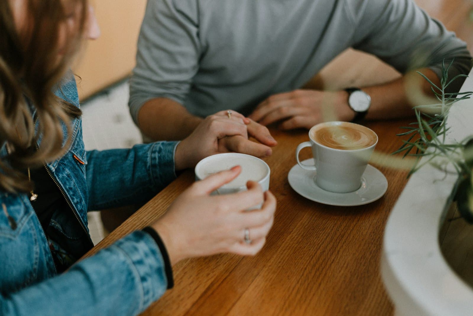 People connecting in a community space, engaged in conversation.